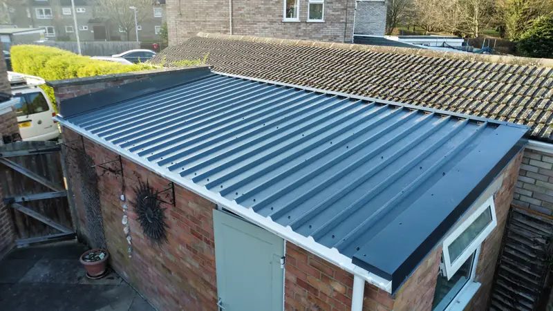 Anthracite box profile metal roof installed on a domestic garage
